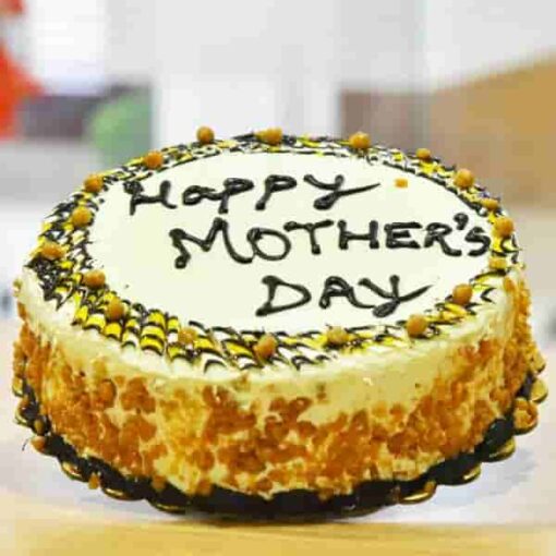 Butterscotch Mother’s Day Cake with creamy butterscotch frosting and decorative elements, ideal for celebrating Mother's Day with a delicious and elegant dessert.