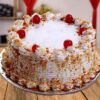 Cherry Flavored Butterscotch Cake featuring a rich butterscotch base with a hint of cherry, topped with cherry pieces and a smooth frosting, perfect for a unique dessert experience.