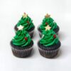 Christmas Tree Cupcakes: Festively decorated with green icing shaped like Christmas trees, complete with colorful edible ornaments and star toppers.