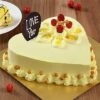 Butterscotch Heart Shaped Cake with rich butterscotch layers and creamy frosting, elegantly designed for romantic occasions and celebrations.