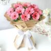 Vibrant Bouquet of Pink Gerberas featuring cheerful, bright pink flowers arranged elegantly, ideal for celebrations, gifts, or adding a touch of joy.