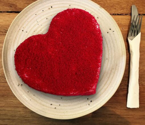 Heart Shaped Red Velvet Cake featuring a rich red velvet cake in a romantic heart shape, ideal for celebrating special moments.