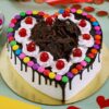 Heart Design Gems Cake with a heart-shaped design and vibrant gem-like decorations, beautifully crafted for a special and memorable celebration.