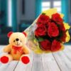 Beautiful Roses with Cute Teddy: a charming gift set featuring a bouquet of fresh roses and an adorable teddy bear, ideal for any occasion.