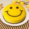 Smiley Chocolate Cake with rich chocolate layers and cheerful smiley face decorations, perfect for adding fun and joy to any celebration.