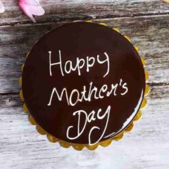 Mother’s Day Truffle Cake featuring rich chocolate layers and a smooth truffle filling, elegantly decorated for a special celebration honoring Mom.