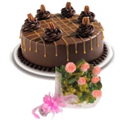 Black Forest Cake with Pink Bouquet: A decadent Black Forest cake accompanied by a vibrant pink flower bouquet, ideal for celebrations.