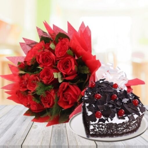 Black Forest Cake with Red Roses Bunch—rich chocolate cake paired with an elegant bouquet of red roses, ideal for special occasions.