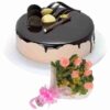 Chocolate Cake decorated with a pink bouquet, featuring rich chocolate layers and elegant floral accents, ideal for special occasions and celebrations.