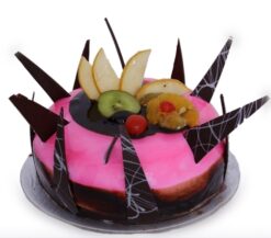 Designer Fruit Cake with vibrant fresh fruits and elegant decorations, layered with moist cake, ideal for celebrating special occasions.