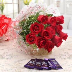 Red Roses Bouquet with Dairy Milk Chocolates, featuring elegant roses paired with delicious chocolates, ideal for any special occasion.