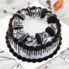 Delicious Chocolaty Oreo Cake: a rich chocolate cake filled and topped with creamy Oreo layers and chunks, perfect for dessert lovers.