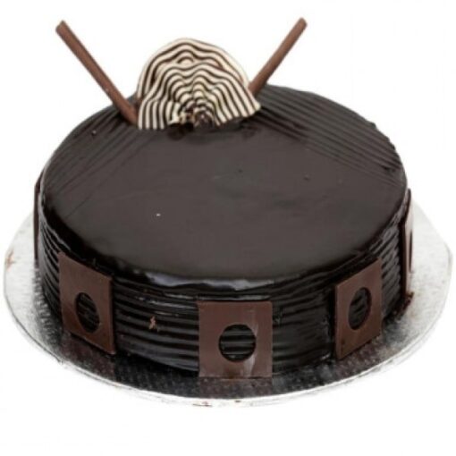 Delicious Dark Chocolate Cake with rich, moist layers and a smooth, velvety finish, ideal for indulging in deep chocolate flavor.