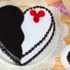 Choco Vanilla Heart Designer Cake with layers of rich chocolate and vanilla, featuring an elegant heart design. Ideal for celebrations.