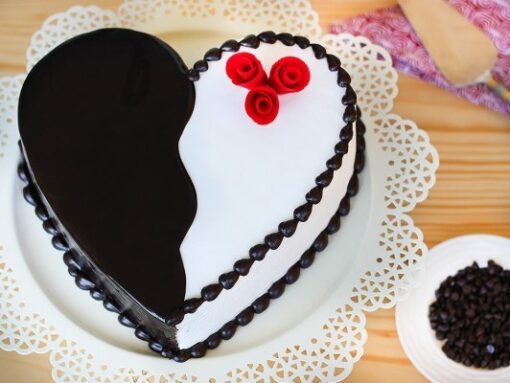 Choco Vanilla Heart Designer Cake with layers of rich chocolate and vanilla, featuring an elegant heart design. Ideal for celebrations.