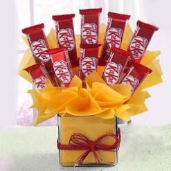 KitKat Bouquet: an elegant arrangement featuring an assortment of KitKat chocolates, beautifully presented as a perfect gift for any occasion.