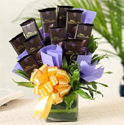 Bournville Chocolate Bouquet Glass Vase featuring a collection of Bournville chocolates arranged in an elegant glass vase, ideal for gifting.