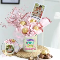 Top view of Cherished Moments Mother's Day Hamper featuring personalized gifts, floral arrangement, and sweet treats, perfect for celebrating Mother's Day.