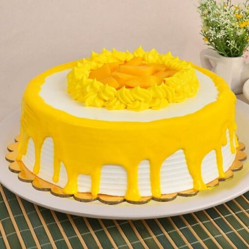 Creamy Layered Mango Cake with rich mango layers and a creamy texture, ideal for tropical-themed celebrations and special occasions.