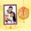 Customized frame with vibrant Ganesha hanging, perfect for home decor and gifting.