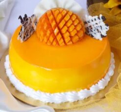 Delicious Mango Cake featuring rich mango flavor and creamy texture, ideal for tropical-themed celebrations and special occasions.