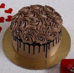 Roses Chocolate Cake with rich chocolate layers and elegant rose decorations, ideal for romantic occasions and adding a luxurious touch to celebrations.