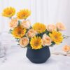 Vibrant bouquet featuring roses and gerberas arranged together, creating a stunning and cheerful floral display for any occasion.