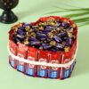 KitKat Choclairs Heart Pie featuring a delicious pie shaped like a heart, filled with KitKat and Choclairs chocolates, perfect for a sweet treat.