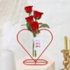 Heart-shaped planter filled with a vibrant bouquet of flowers, ideal for expressing love on special occasions like anniversaries or Valentine's Day.