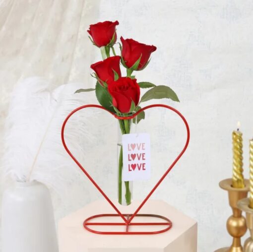 Heart-shaped planter filled with a vibrant bouquet of flowers, ideal for expressing love on special occasions like anniversaries or Valentine's Day.