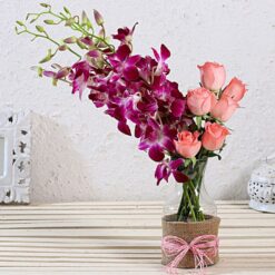 Mixed Flowers Jar Arrangement featuring an assortment of fresh flowers arranged in a stylish jar, ideal for gifting or decorating.