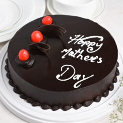 Mom's Chocolate Heaven Cake with rich chocolate layers and creamy frosting, ideal for an indulgent and luxurious Mother's Day dessert.