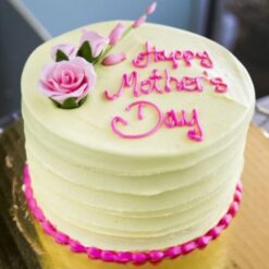 Mom's Creamy Dream Cake with rich, creamy layers and smooth frosting, ideal for a luxurious and indulgent Mother's Day dessert.