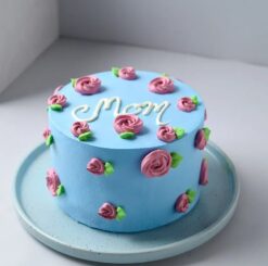 Mom's Elegant Blue Floral Delight cake featuring intricate blue floral decorations, ideal for a stylish and memorable celebration.