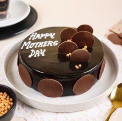 Mom's Elegant Truffle Celebration Cake adorned with rich truffles and a sophisticated design, ideal for a luxurious Mother's Day treat.