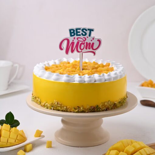 Mom's Mango Pistachio Fusion Cake featuring tropical mango and crunchy pistachios, perfect for a refreshing and flavorful Mother's Day celebration.