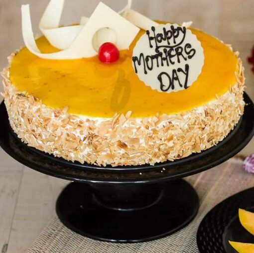 Mom's Sweet Mango Temptation Cake with luscious mango flavors and creamy layers, ideal for a refreshing and tropical Mother's Day dessert.