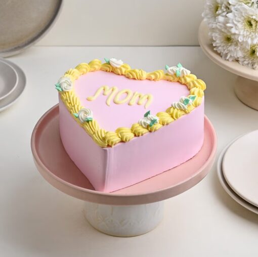 Mom's Sweet Pink Heart Affection Cake decorated in soft pink with heart-shaped design, perfect for expressing love on special occasions.