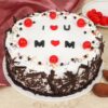 Mom's Timeless Black Forest Cake with layers of rich chocolate, cherries, and whipped cream, ideal for a classic and delicious Mother's Day treat.