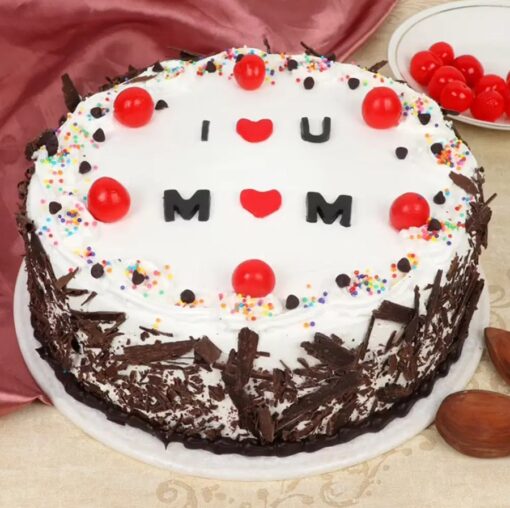 Mom's Timeless Black Forest Cake with layers of rich chocolate, cherries, and whipped cream, ideal for a classic and delicious Mother's Day treat.