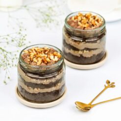 Nutty Bliss Twin Gourmet Jar Cake Set featuring two jars of gourmet cake with a rich blend of nuts and indulgent flavors.