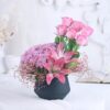 Elegant bouquet in shades of pink, showcasing a variety of blooms for a sophisticated and timeless floral arrangement, ideal for any special occasion.