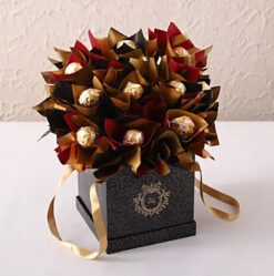 Rocher Bunch in Rectangular Box featuring an assortment of Ferrero Rocher chocolates elegantly arranged in a rectangular box, ideal for a gift.