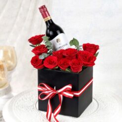 Elegant bouquet featuring roses arranged with a rose wine theme, perfect for adding a touch of sophistication to any special occasion.