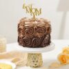 Rosy Delight Chocolate Cake with rich chocolate layers and elegant rose decorations, ideal for a luxurious and memorable Mother's Day dessert.