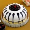 Round Shape Black Forest Cake with classic layers of chocolate, cherries, and whipped cream, ideal for adding a touch of indulgence to any celebration.