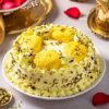 Butterscotch cake topped with creamy rasmalai layers, offering a rich and indulgent dessert experience perfect for celebrations.