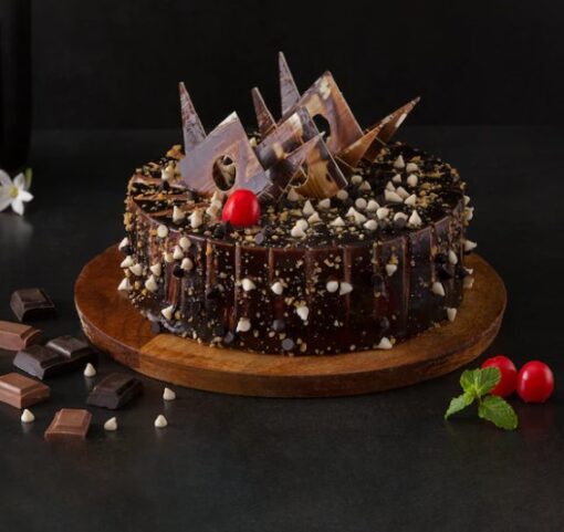 Marble Crunch Truffle Cake featuring a marble cake base with crunchy truffles, ideal for a rich and textured dessert.