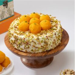 Motichoor Ladoo Cake featuring layers of traditional motichoor ladoos integrated into a cake, combining classic flavors with a modern twist.