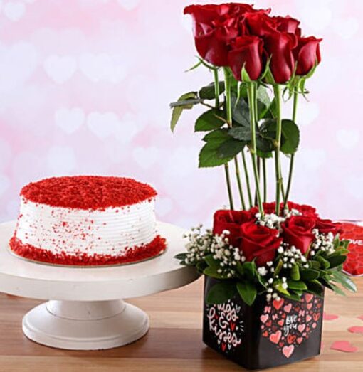 Red Roses & Velvet Cake Combo featuring a bouquet of red roses paired with a decadent velvet cake, ideal for celebrations.